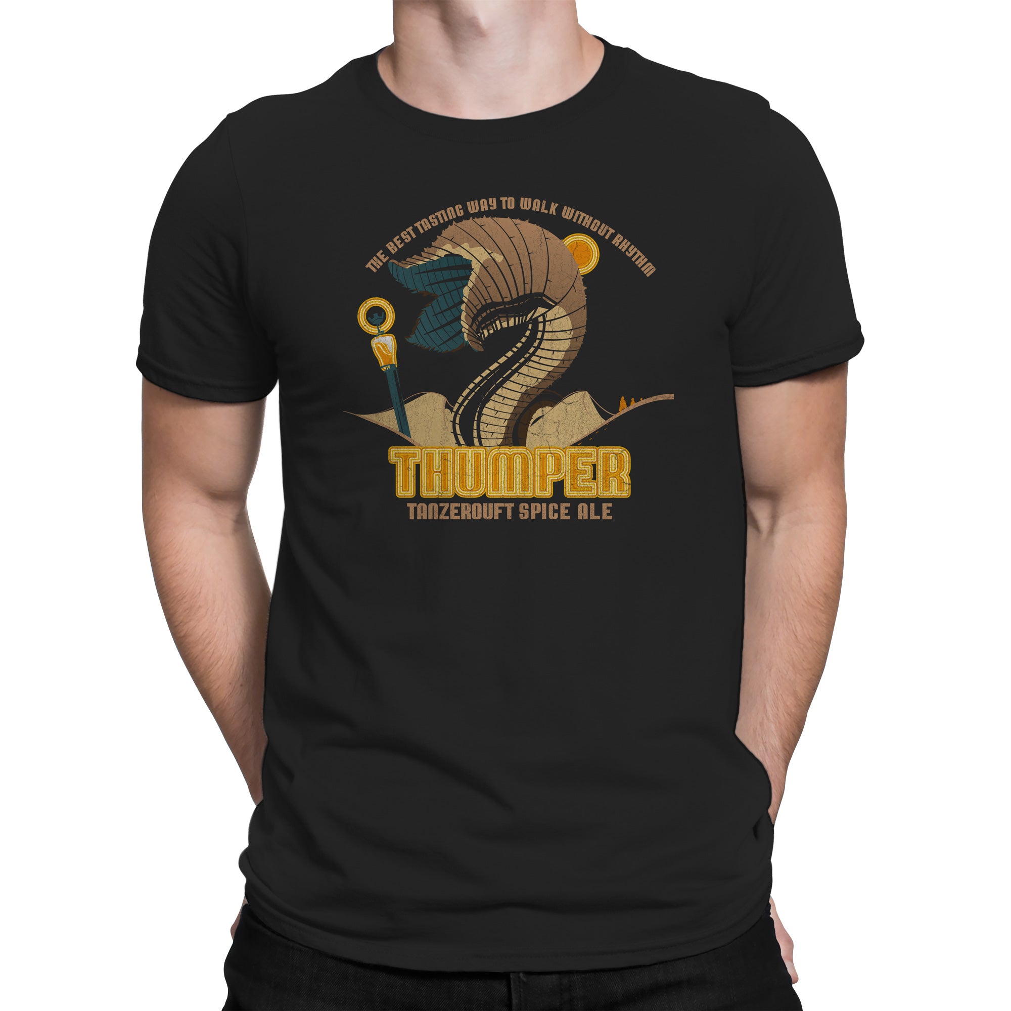 Black t-shirt with Dune-style sandworm bursting from dunes and spice thumper staff