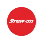 Brew-On coaster in red with white text, celebrating homebrew and beer gadgets