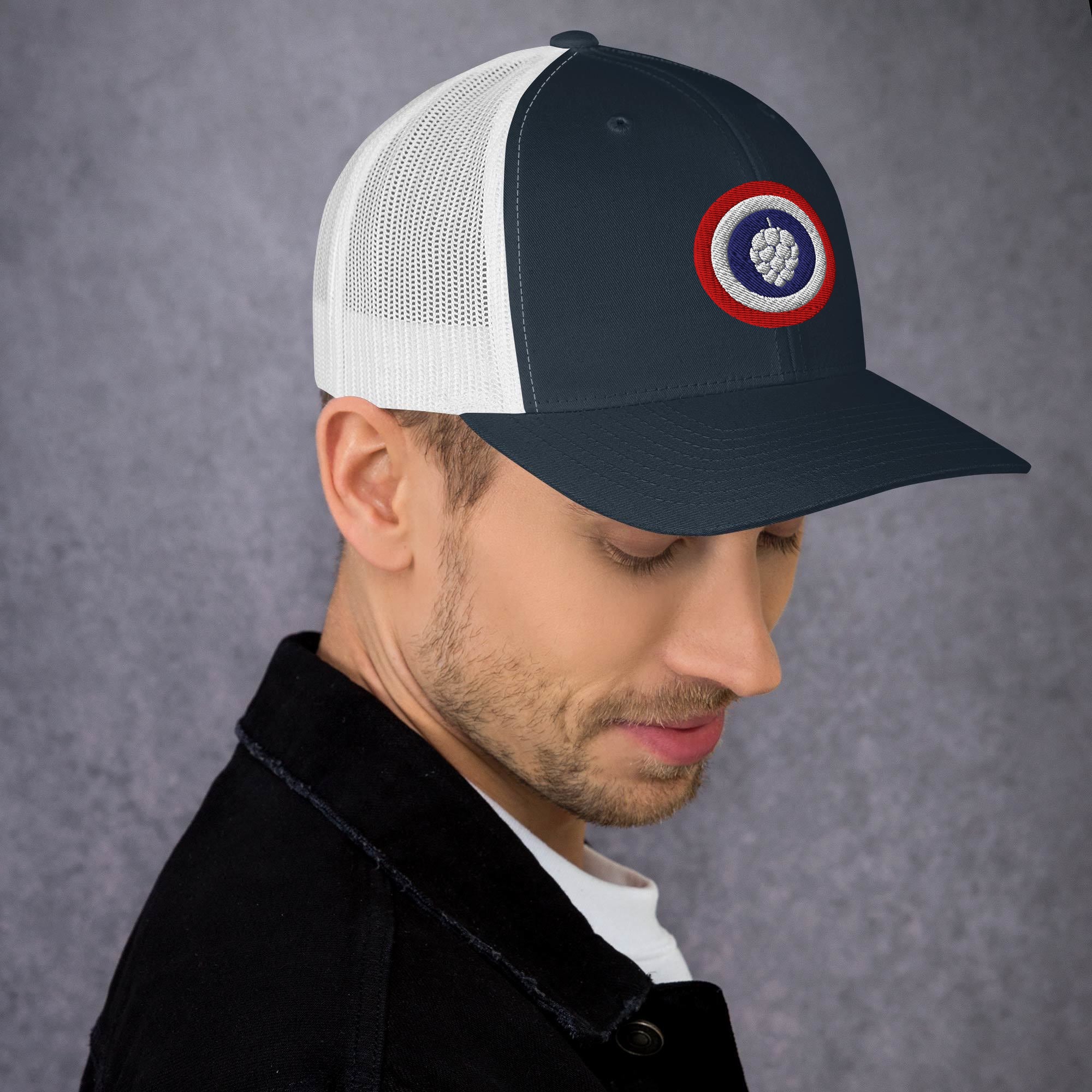 Mesh-back trucker cap with embroidered hop shield design