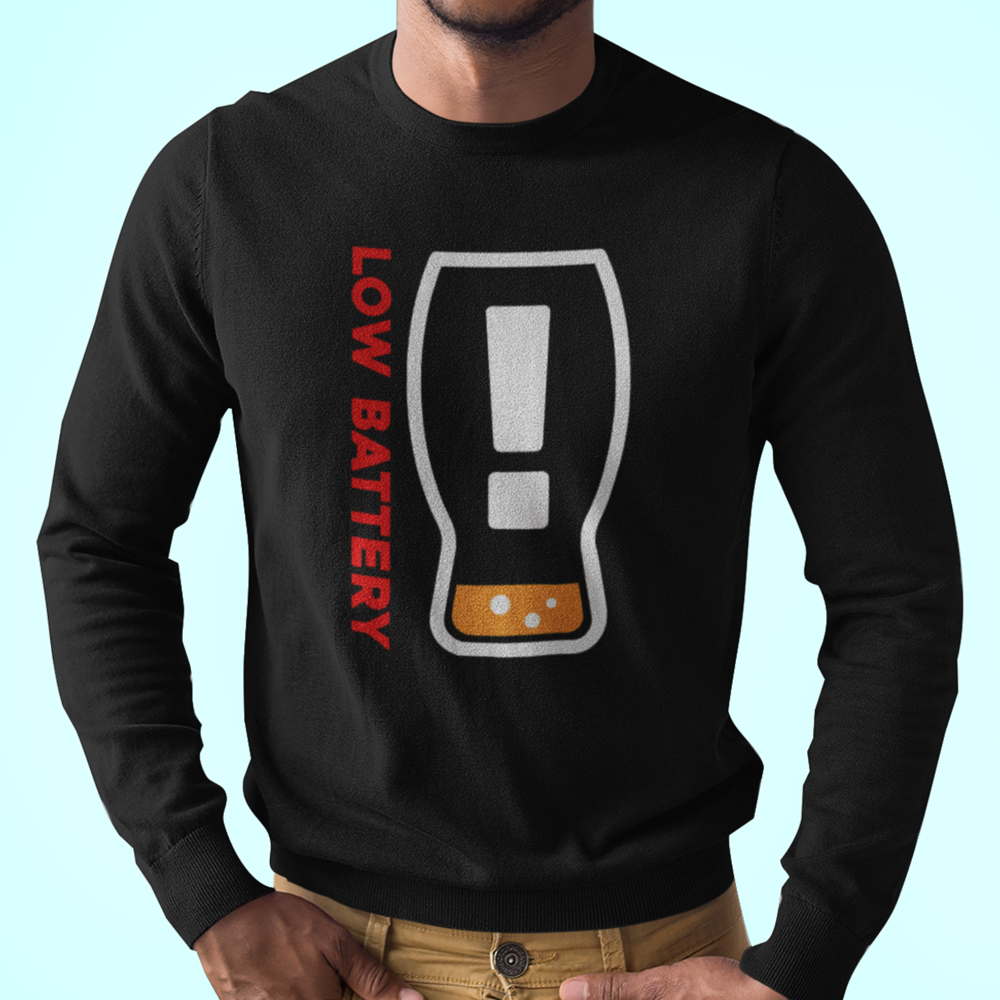 Black long-sleeve tee with low battery icon and Need a Refill text