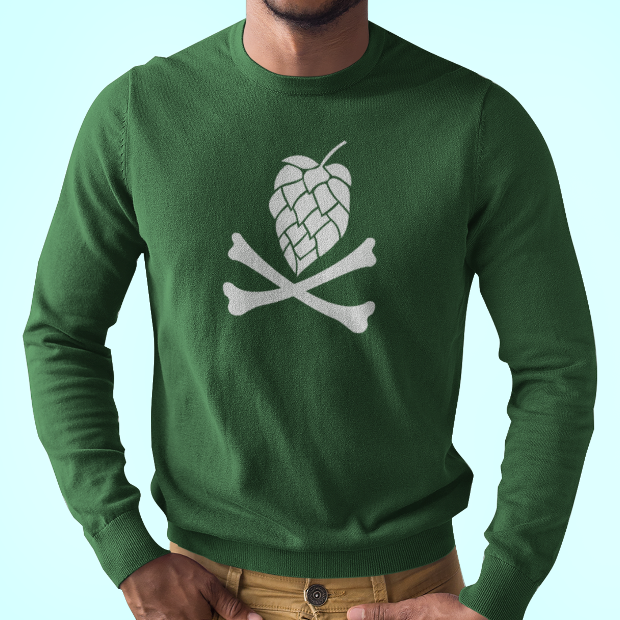 Forest green long-sleeve tee featuring hop cone above crossed bones design