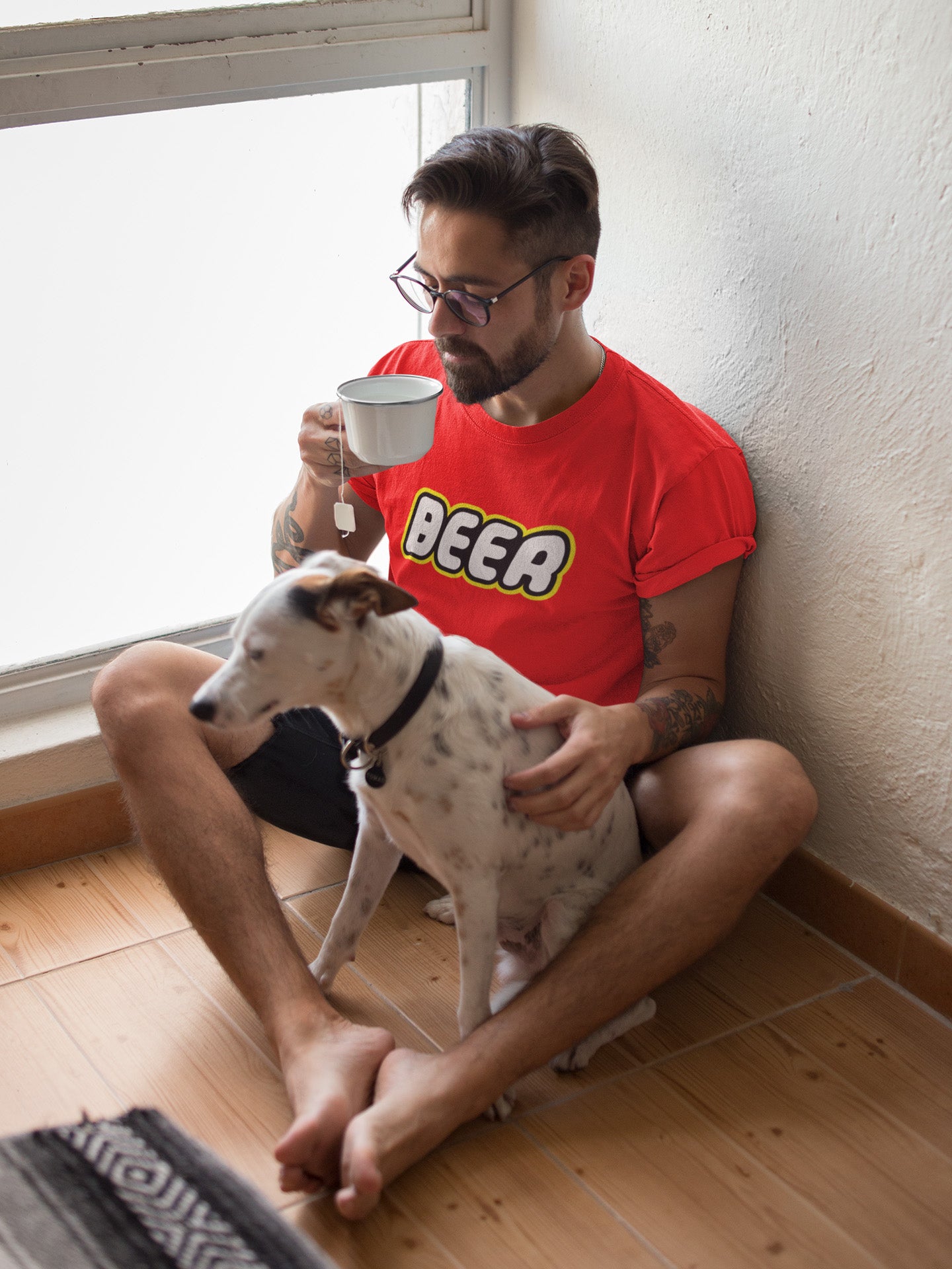 Model wearing the Beer Brick Building Blocks T-Shirt, demonstrating the comfortable fit and vibrant graphic.