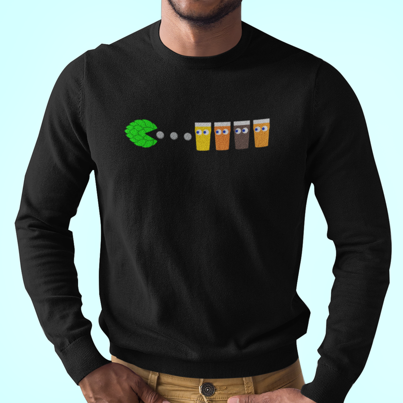 Black long sleeve tee with hop-cone Pac-Man chasing four pints of beer