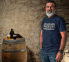 Close-up of Ca S K elements shaped like kegs on beer shirt