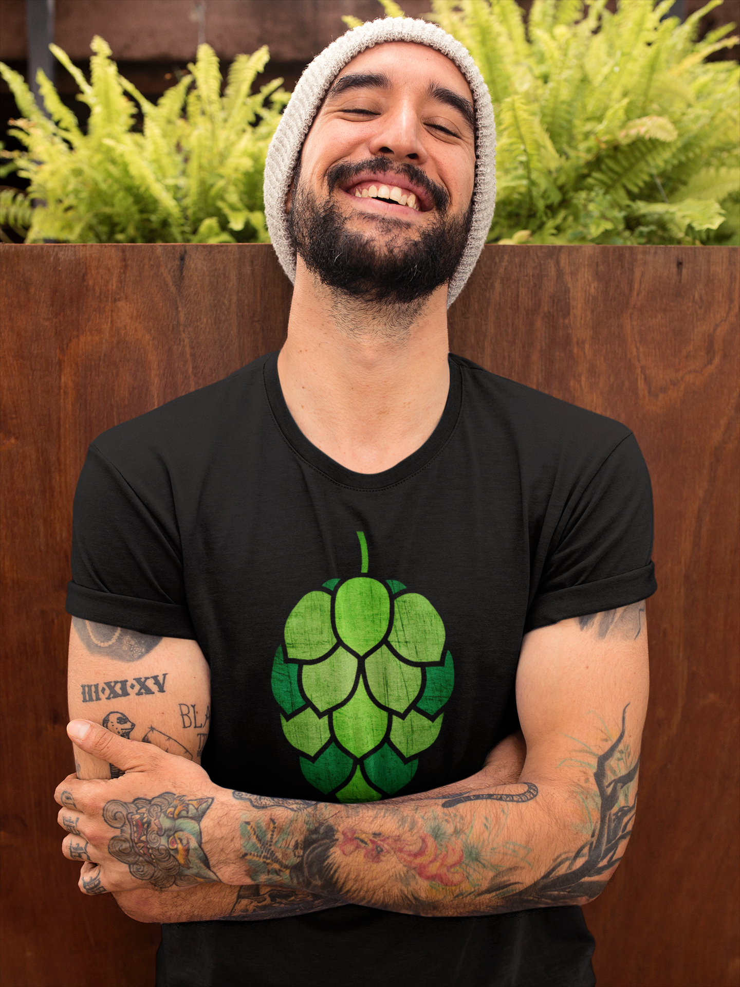 Front view of cathedral-style stained-glass hop cone on black shirt