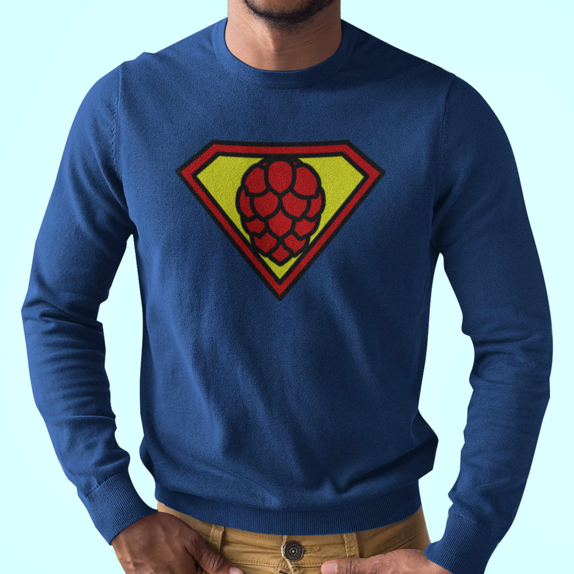 Blue long-sleeve t-shirt with SuperHop pentagonal shield and hop-cone graphic