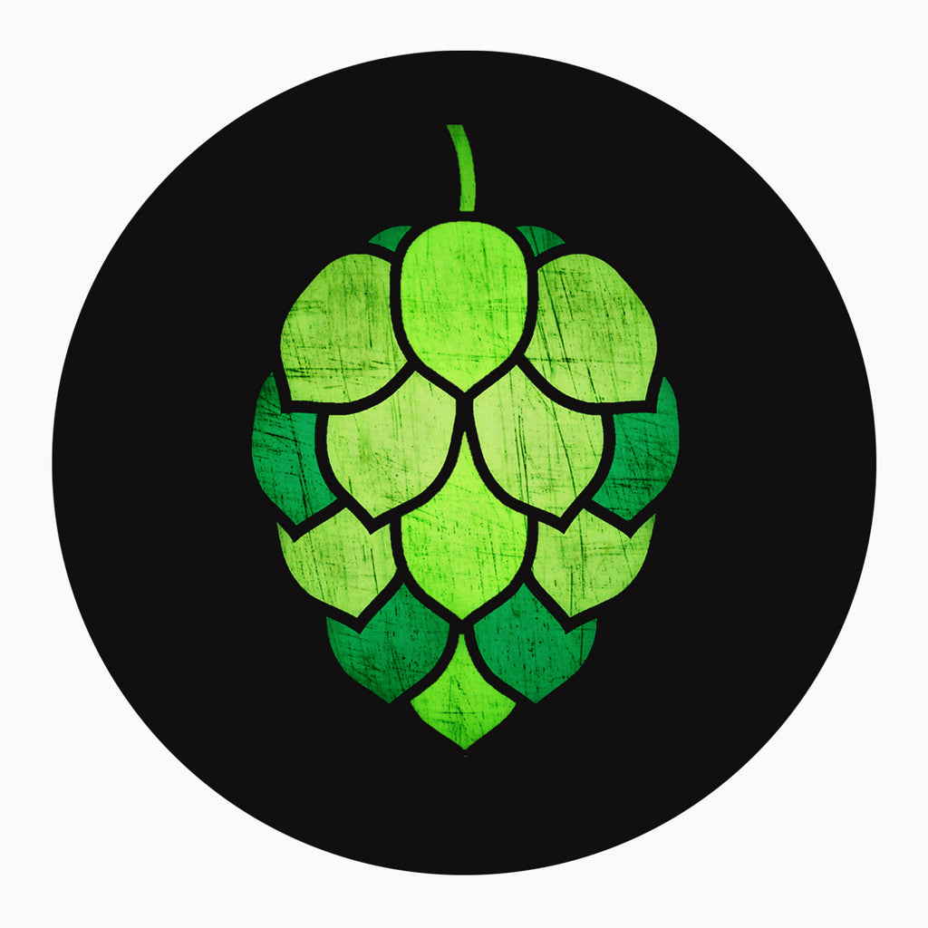 Round black coaster with stained-glass hop-cone graphic in green