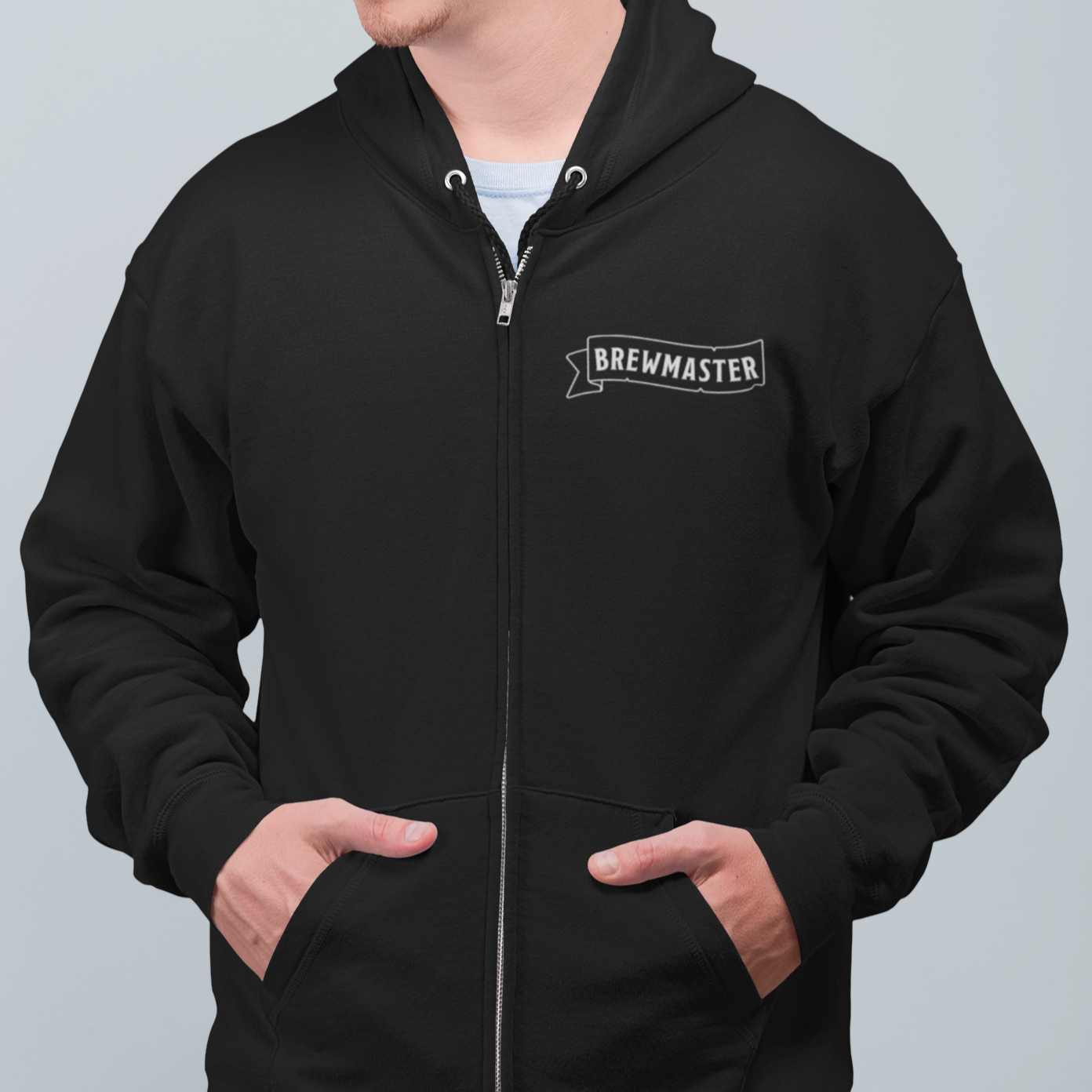 Front view of zip-up hoodie featuring white BrewMaster text on the chest