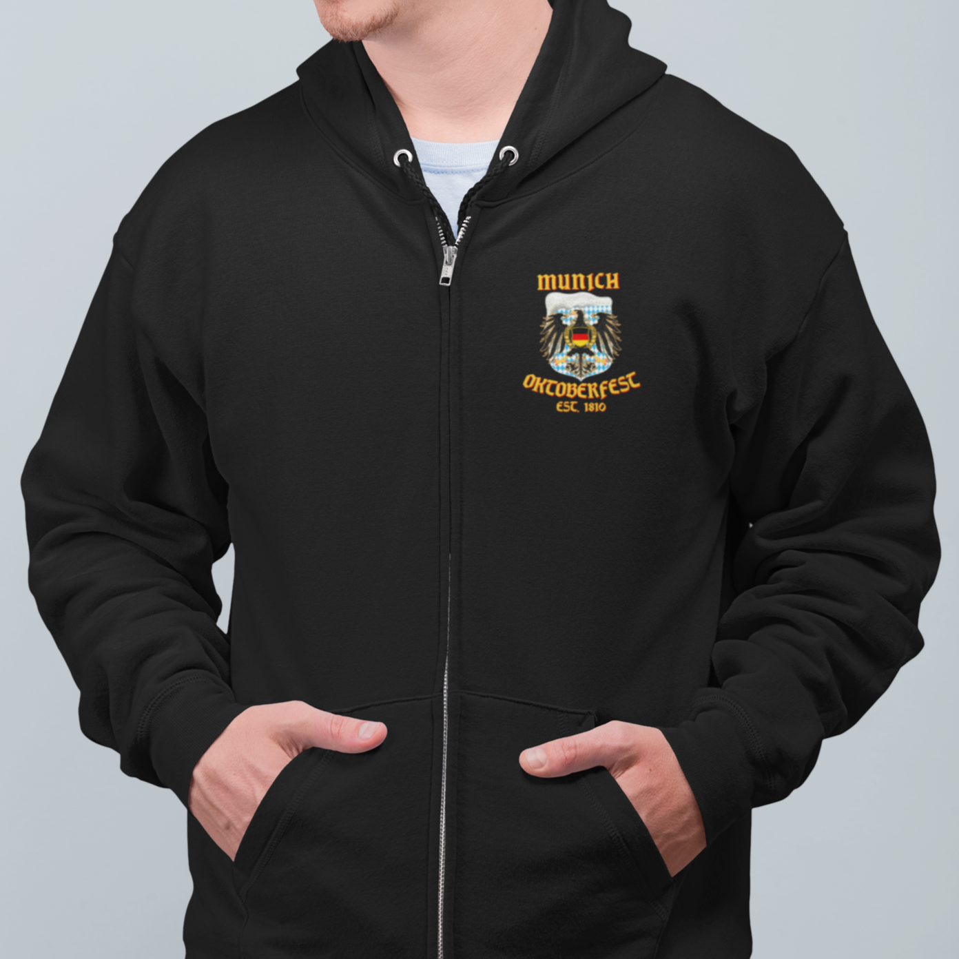 Black zip-up hoodie with small eagle crest on front breast