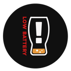 Round black coaster with low battery icon and Need a Refill text