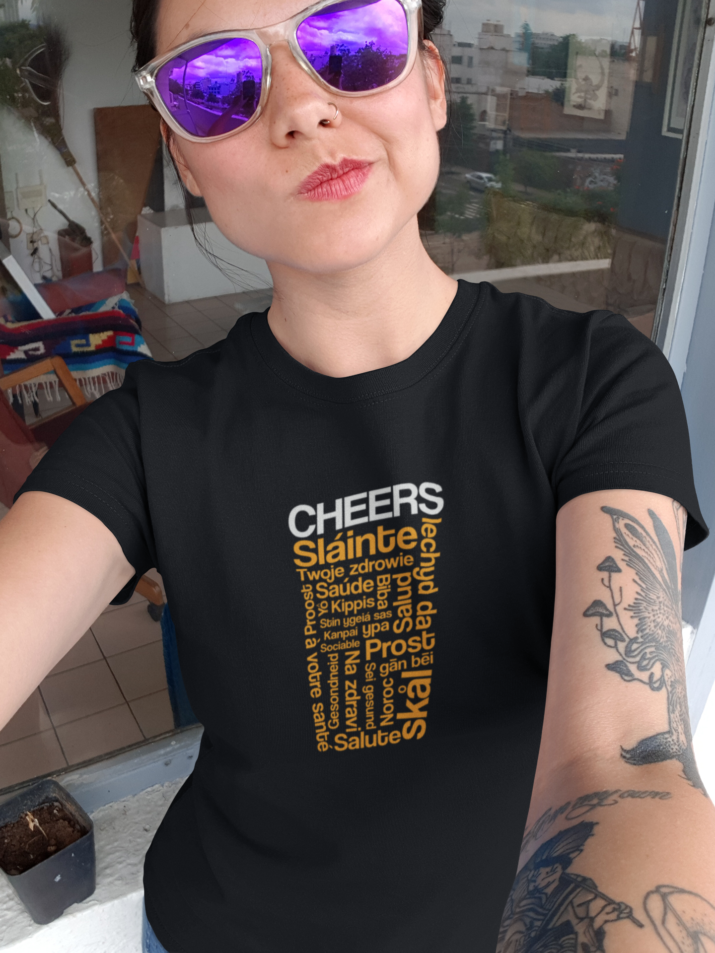 Unisex shirt with international cheers text forming beer pint image